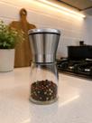 Moedor de Temperos em Aço Inox e Vidro Manual 13,5x6,4cm