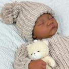 Muñeca Reborn Bebé GUESSBELLY Piel Negra Dormida 48cm para Niños