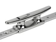 O calço e o grampo montam o Schaefer Mid-Rail em trilho em T de 1,25 x 0,48 cm