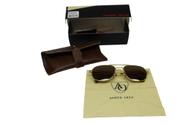 Óculos de sol American Optical Checkmate 145 c/ lentes polarizadas e armação em ouro 23k Óculos de sol American Optical Checkmate 145 c/ lentes polarizadas e armação em ouro 23k