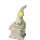 Papai noel sentado verde com ilumnação Papai noel sentado verde com ilumnação