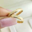 Par de Aliancas Ouro 18K Luna com 2 mm largura, bordas chanfradas e diamantada
