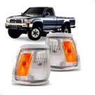 Par pisca seta hilux 4x4 1992 a 2001 aro cromado largo