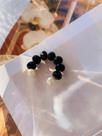 Piercing fake de orelha modelo redondo G cristal folheado