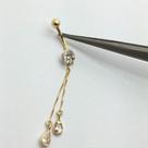 Piercing Umbigo Pedra Branca Redonda Ponto de Luz com Gotas Empendurada Ouro 18k-750 C215K110 Piercing Umbigo Pedra Branca Redonda Ponto de Luz com Gotas Empendurada Ouro 18k-750 C215K110