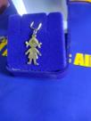 Pingente Boneca 23 mm Ouro 18 Kilates Peso 0.70 Gramas