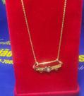 Pingente Ganga para 2 Bonecos Ouro 18 kilates Peso 0.47 Grama 22 x 2 mm
