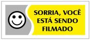 Placa - sorria, voce esta sendo filmado - amarela / em ps 20 x 7cm emplac br