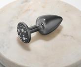 Plug p onix com pedra cravejada em strass