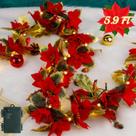 Poinsétia de Natal Garland Glintoper iluminada 1,8 m com 36 flores