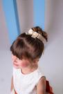 Porta Coque Belli Kids Marfim com Laço e Strass Porta Coque Belli Kids Marfim com Laço e Strass