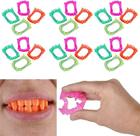 Presas de néon Halloween Teeth The Dreidel Company, pacote com 100