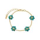 Pulseira alice flor mini howlita turquesa folheada a ouro 18k