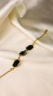 Pulseira com pedras pretas