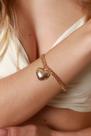 Pulseira de coração liso no dourado com 10 milésimo.