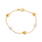 Pulseira Dourada de Pérolas e Esferas Vazadas Pulseira Dourada de Pérolas e Esferas Vazadas