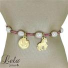 Pulseira em cristais rosas com pérolas e pingentes ferradura com cavalos folheado em ouro 18k
