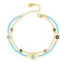 Pulseira Evil Eye de dupla camada com miçangas turquesas para mulher