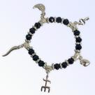 Pulseira Exu Preto com Prata e Penduricalhos Cristal