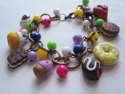 Pulseira feminina cores aleatória.