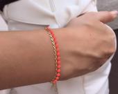 Pulseira gravata com resina rosa chiclete banhada em ouro 18k