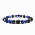 Pulseira Lava Stone azul e preta com espaçadores dourados