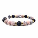 Pulseira Lava Stone rosa e preta com espaçadores dourados