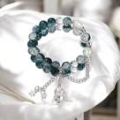 Pulseira Luxo com Cristais Azuis e Transparente Detalhes Estrelas em Prata