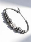 Pulseira Maleável Com Esferas e Coração Com Glitter Aço Com Extensor