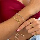 Pulseira perola coração dourado