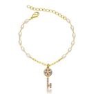 Pulseira pérolas ovais e pingente chave cravejada Pulseira pérolas ovais e pingente chave cravejada