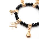 Pulseira Pomba Gira Preta e Dourada Cristal e Silicone