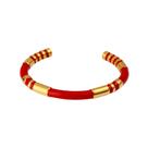Pulseira preta e dourada com detalhes dourados para homens