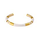Pulseira preta e dourada com listras douradas para homens