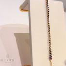 Pulseira regulavel rivieira cravejado com zircônias lilas banhado a ouro 18k