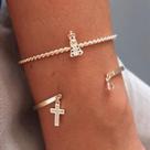 Pulseira Rígida Nossa Senhora Aparecida e Cruz - Banhada a Ouro Amarelo Pulseira Rígida Nossa Senhora Aparecida e Cruz - Banhada a Ouro Amarelo