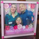 Quadro com fotos e flores