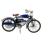 Re miniatura de bicicleta em metal azul