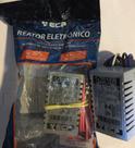 Reator eletronico bivolt p/ uma lampada fluorescente tubular 18/20w