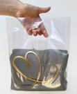Sacola Plástica Transparente Brilhoso Kit com 60 unidades com Alça Vazada Eventos e Vendas