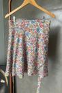 Saia Envelope Curta Flores Feminina Lamour