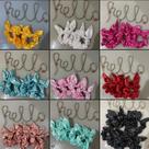 Scrunchie de cetim com laço removível