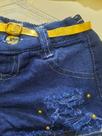 Short jeans infantil rasgado