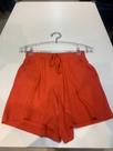 Short laranja