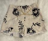 Shorts tecido c/ correntes estampado