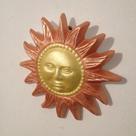 Sol em resina decorativo
