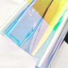 Tecido de vinil PVC holográfico iridescente transparente 30 x 135 cm Tecido de vinil PVC holográfico iridescente transparente 30 x 135 cm