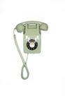 Telefone fixo GPO 746 retrô montado na parede com botão de pressão verde