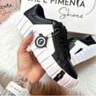 Tênis preto pimenta