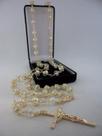 Terço cristal aust. furta cor 8x6mm esp. - folh. ouro